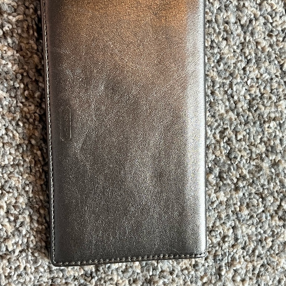 Coach check cover